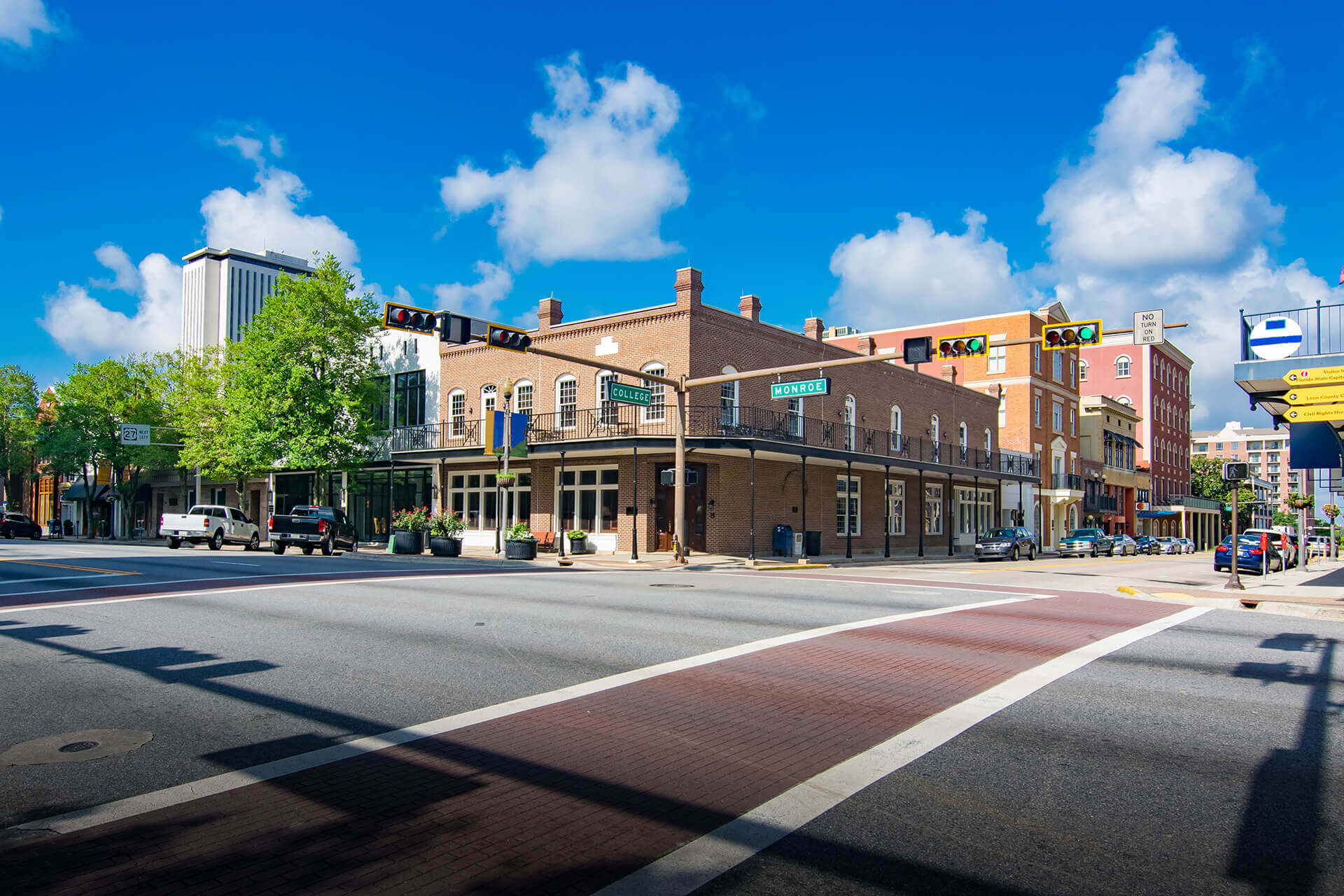 On the corner of college and monroe street during the daytime On the corner of college and monroe street during the daytime