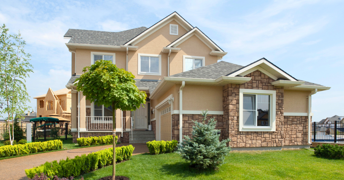 Brand new suburban house in sunny summer afternoon