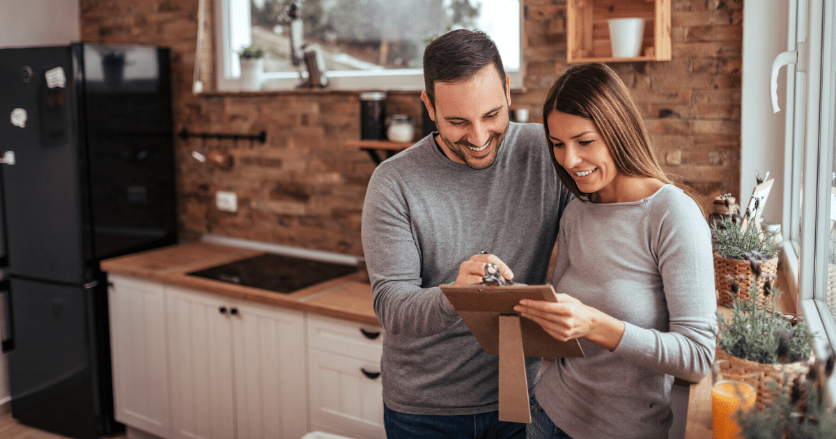 Couple making plans for a home renovation in the winter