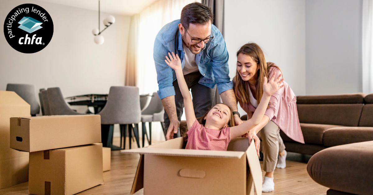 Happy family with cardboard boxes