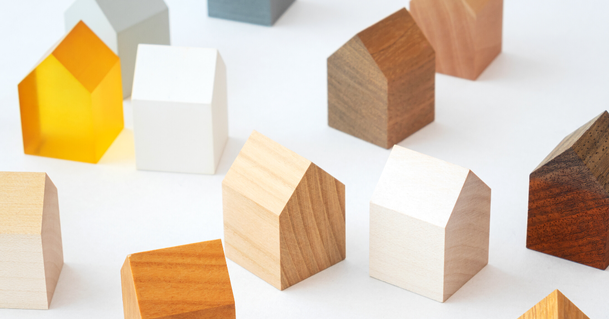 Wooden models of houses in multiple colors