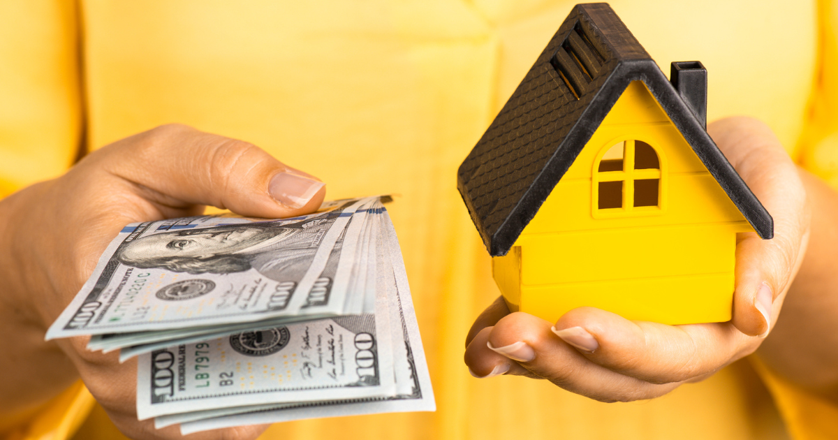 Woman Holding 100 Dollar Bills And Model House