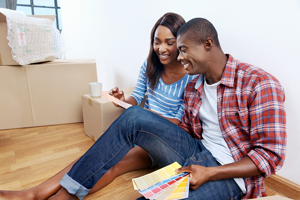 Young couple picking out paint colors 2