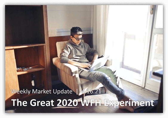 A man sitting on a chair with a laptop