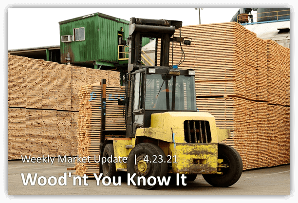 A forklift carrying wood