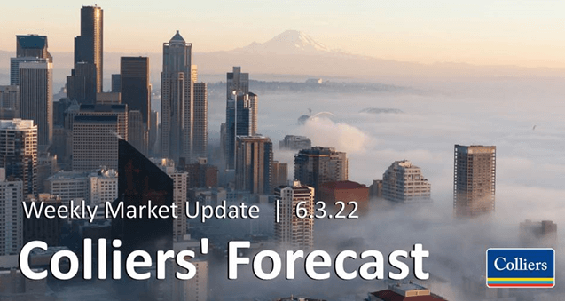 Colliers Forecast - Seattle cityscape covered in fog