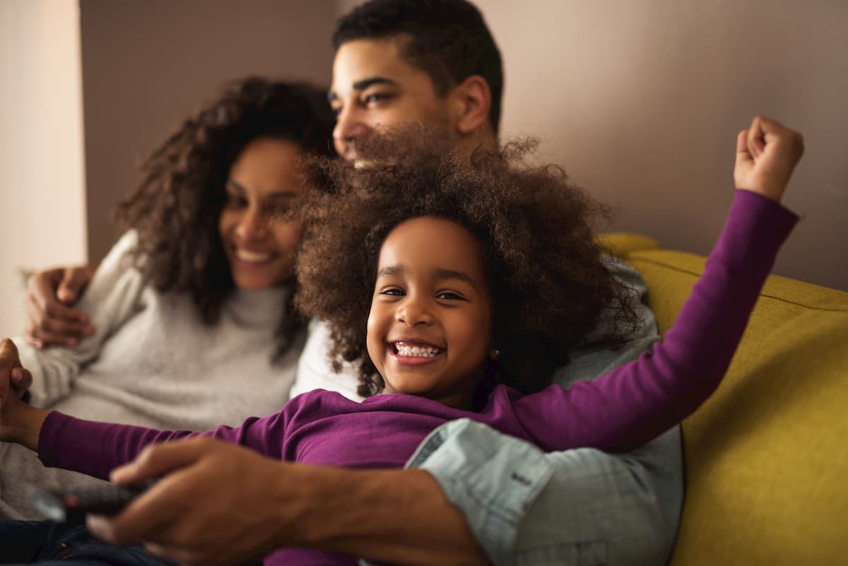 Young black family on couch